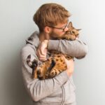 Andrew with his Bengal cat Haroun