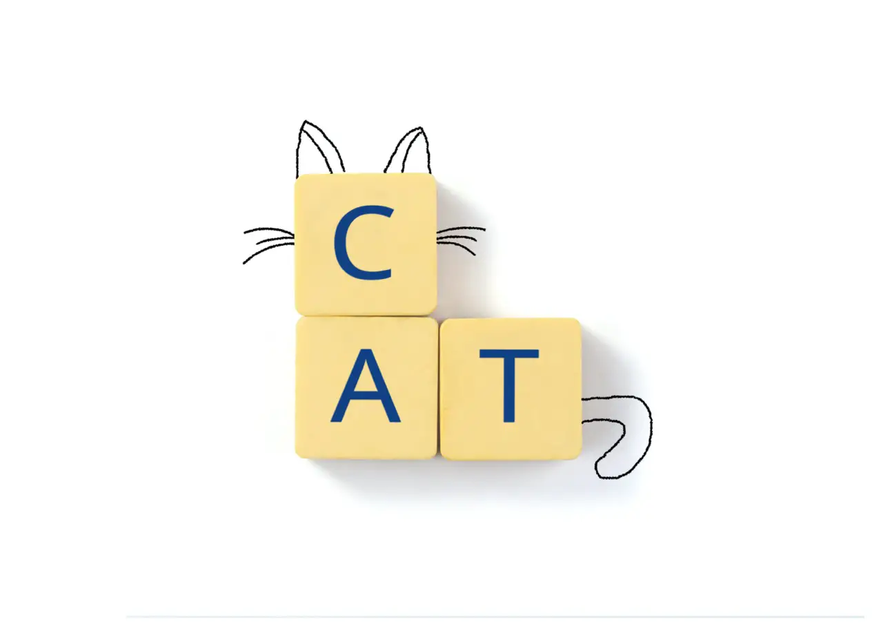 the word cat spelled out in scrabble tiles and styled to resemble a cat with cat ears, whiskers and a tail